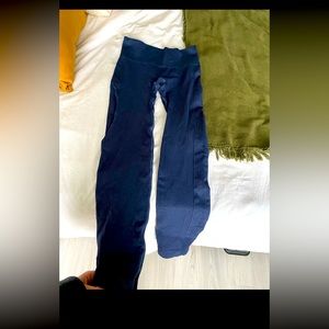 Lululemon size 2 women’s dark blue leggings. I forget the name of these